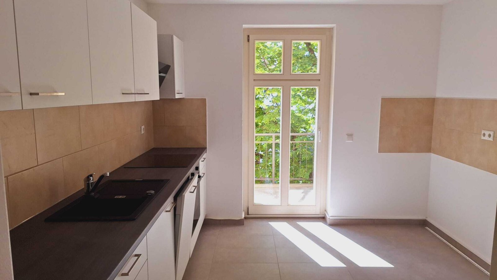 Wohnen im Grünen - Exklusive 2 Raumwohnung mit EBK und Fußbodenheizung