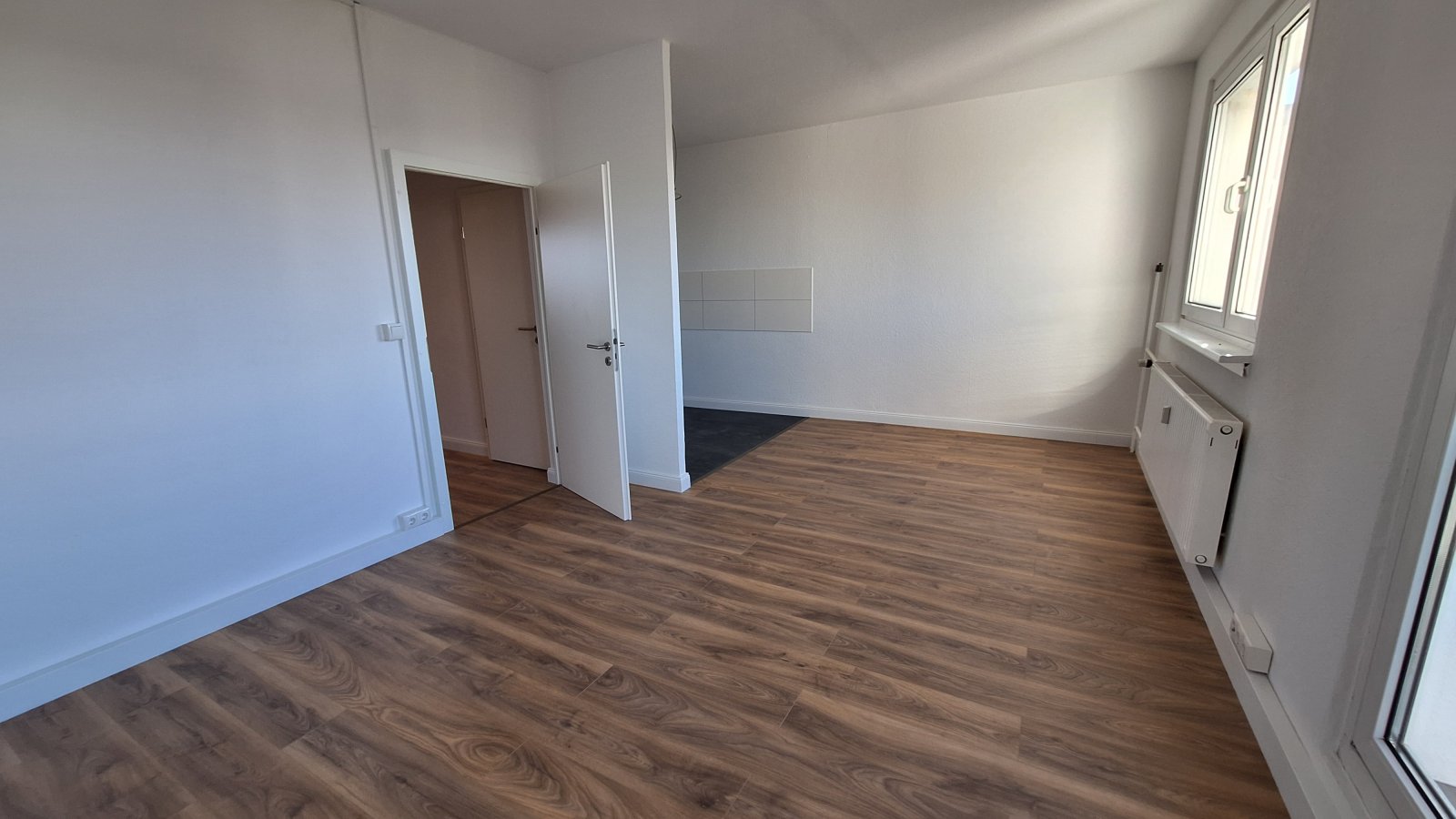 Familienwohnung mit 4 Schlafbereiche, großes Wohnzimmer und Balkon